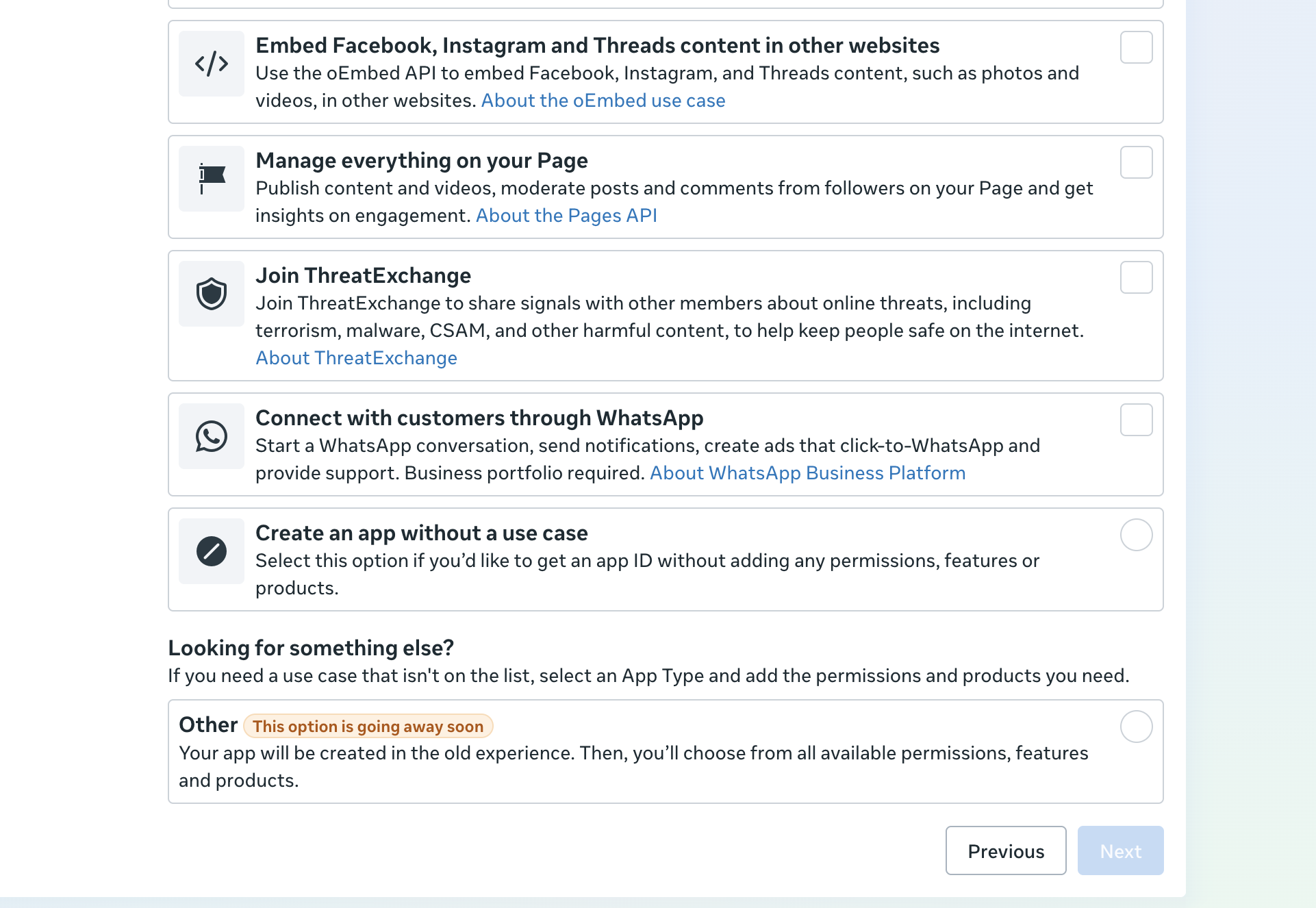 Meta app-creation use-case list with 'Connect with customers through WhatsApp' highlighted
